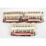 Six Heavy Quality 2 Tier Trams with Motors, all hand painted. Unmarked. Condition - Some losses