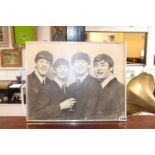 Chrome Framed Photographic print of the Beatles signed in Ink
