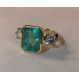A Exquisite Ladies 18ct Gold Octagonal Emerald and Diamond Set Ring GCS Certificate
