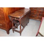 19thC Elm Oval Gateleg table on turned supports, 116cm in Width