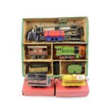 Boxed Hornby O Gauge Clockwork with 2810 Loco and and Tender, Boxed Esso Tender, Flat truck etc