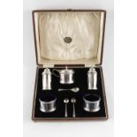 Boxed C M Mackay & Co of Glasgow boxed Silver 5 Piece Silver Cruet set with blue glass liners and