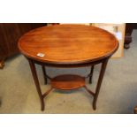 Edwardian Oval Inlaid Walnut side table with undertier, 68cm in Diameter