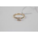 14ct Gold Ladies Diamond Claw set Single Stone Diamond Ring 0.40ct G/H i1 Estimated, with channel