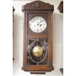 Oak cased 1940s Wall clock with numeral dial