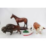 Beswick figure of Mill Reef on wooden base, Beswick Bison, Hereford Bull and a Snoopy Money Box