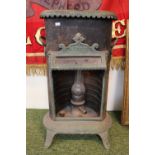 19th century vintage petrolux stove with canopy and floral detail to the metal