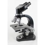Ernst Leitz Wetzlar of Germany Binocular Microscope with 4 Lenses, fitted case and Power supply