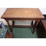 Late Victorian Walnut fold over card table on turned reeded legs, with galleried supports