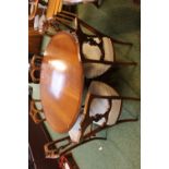 Set of 6 Carved Victorian dining chairs on upholstered seats and splayed legs, with a Later Circular