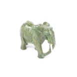 Green Stone Carved figure of a Elephant with carved tusks