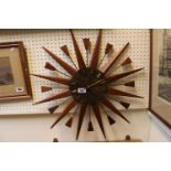 Manler 1970s Wall clock of Sunburst design with Teak and Plastic design