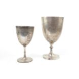 A Victorian engraved goblet ? London 1866 and another larger ? B?ham 1922, both relating to
