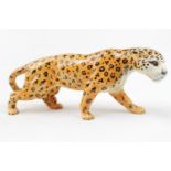 Large Beswick of a prowling Leopard with circular stamp to base