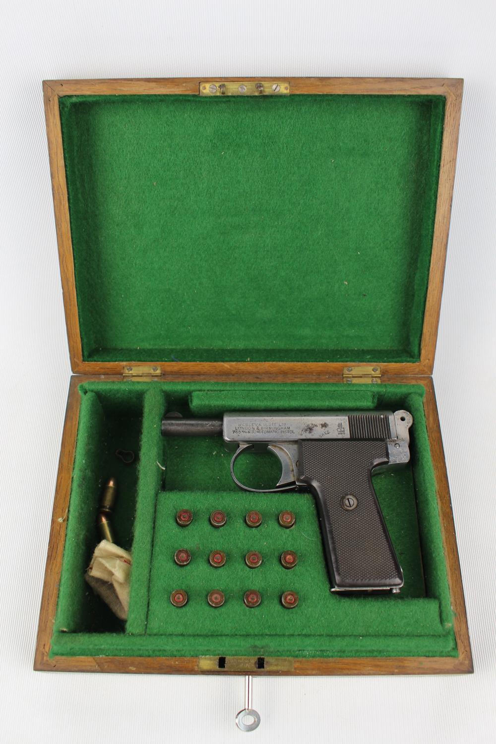 Cased Webley & Scott 1908 Model Automatic Pistol in .32/7.65mm calibre with a number of inert