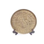 Religious Brass Circular plaque depicting the Birth of Christ marked 1706 initialled CS, 24cm in