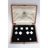 A 9ct Mother of Pearl dress set, with belcher link connectors, 2cm long; with Four matching