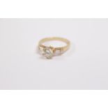 Very Good Quality Ladies 1ct Diamond Solitaire Ring in claw setting G/H Si Estimated flanked by 2