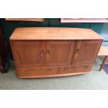 Ercol 3 door 1960s blue label period light wood sideboard on casters in good condition