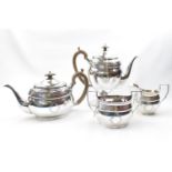 3 Piece 20thC Silver Tea set comprising of Teapot water jug, sugar bowl and milk jug with laurel