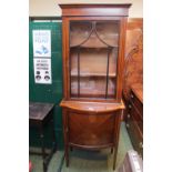 Edwardian Walnut glazed Inlaid cabinet with lined interior over shaped quartered veneered base