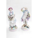 Pair of 19thC European figures of Flower sellers in Georgian Dress, marks to base. 26cm in Height