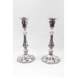 Pair of Good quality Silver plated shaped candlesticks with weighted bases