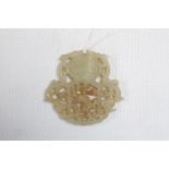 Late 19thC Chinese Mutton Fat Jade Pendant depicting a Urn with foliate detail