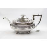 George III Boat Shaped Silver Teapot with scallop shell and ribbed decoration, supported on ball