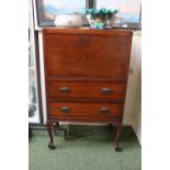 Simple 20thC Rectangular bureau with oval drop handles over ball and claw feet