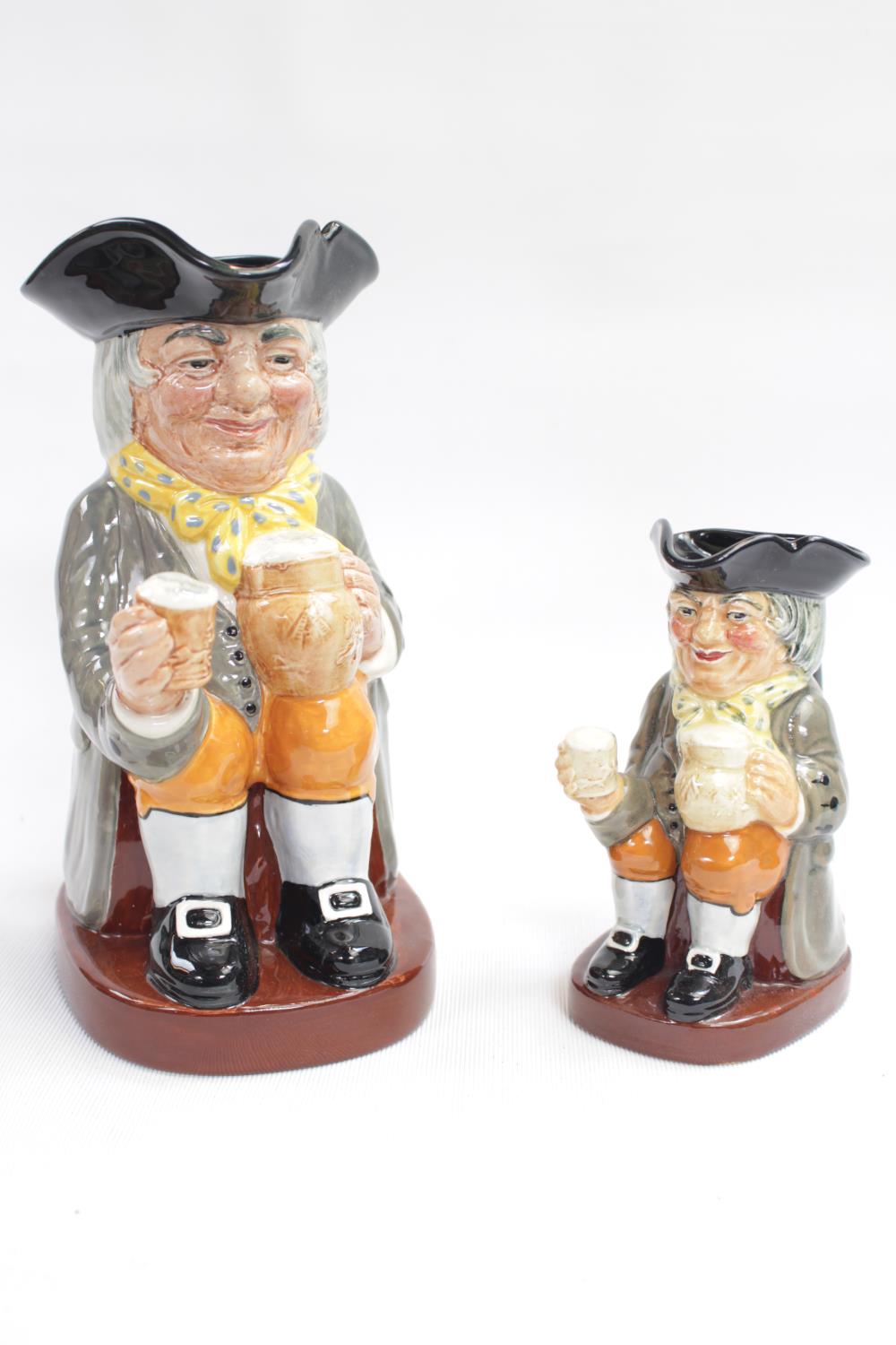 Royal Doulton Happy John Toby jug with impressed mark 8321 and a Smaller Happy John Toby Jug Rd