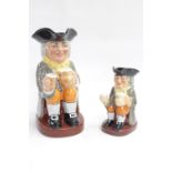 Royal Doulton Happy John Toby jug with impressed mark 8321 and a Smaller Happy John Toby Jug Rd