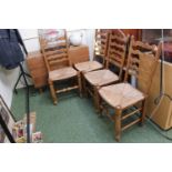 Set of 4 Ladder back dining chairs with rush seats and turned supports