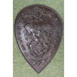 Heavy 19thC Bronze Shield plaque with classical embossed decoration depicting a battle, rope border,