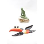 Guinness Carltonware Wall sconce Toucan and a Carlsberg Porcelain nude on a rock