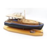 Models of Hemingway's Boat 'Pilar' with similarly titled book 'Hemingways Boat' plus two books on