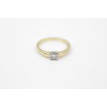 Contemporary 18ct tension set Princess cut Diamond ring with white gold setting 0.35ct H/I Si