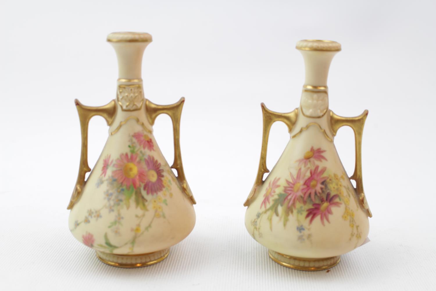 Pair of Royal Worcester Blush Ivory two handled vases with floral sprig decoration pattern 1021 10cm