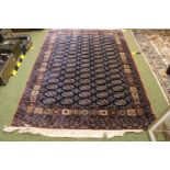 Good Quality Silk Deep Blue Rug with medallion design and tassel ends 227 x 147cm