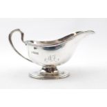 A Georgian-style sauce boat on an oval pedestal base - 6" wide - Sheffield 1906 by Martin HALL &