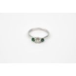 Good quality Ladies Platinum Diamond and Emerald claw set ring, retailed by Cellini 3.3g total