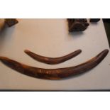 Original Australian Aboriginal Hunting Boomerang with carved animal decoration and smaller Boomerang