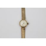 Ladies 9ct gold Omega Cocktail watch with baton face 15g total weight
