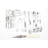 Collection of Silver Sugar tongs, Napkin rings etc
