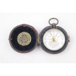 Cased Norman Stewart & Co of High Holborn London Pocket barometer in red leatherette case