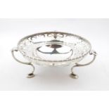 Ornate Edwardian Silver pierced centrepiece supported on tripod base and pad feet Sheffield 1912,