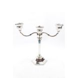 A candelabra with octagonal V shaped stem and three candle holders - 9" high - Birmingham 1976