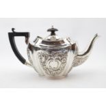 Late Victorian Silver Oval boat shaped Teapot with embossed foliate decoration by John Millward