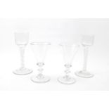 2 18th Century wine glasses with opaque air twist stem and large footed bases 15cm in Height and 2