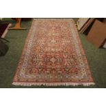 Salmon and Cream 20thC Rug with knotted ends 204 x 127cm